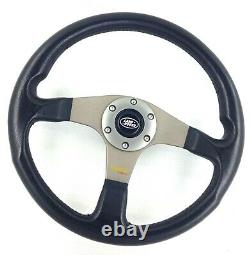 Genuine Momo Tuner black leather steering wheel with Land Rover centre. 7D