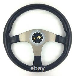Genuine Momo Tuner black leather steering wheel with Land Rover centre. 7D